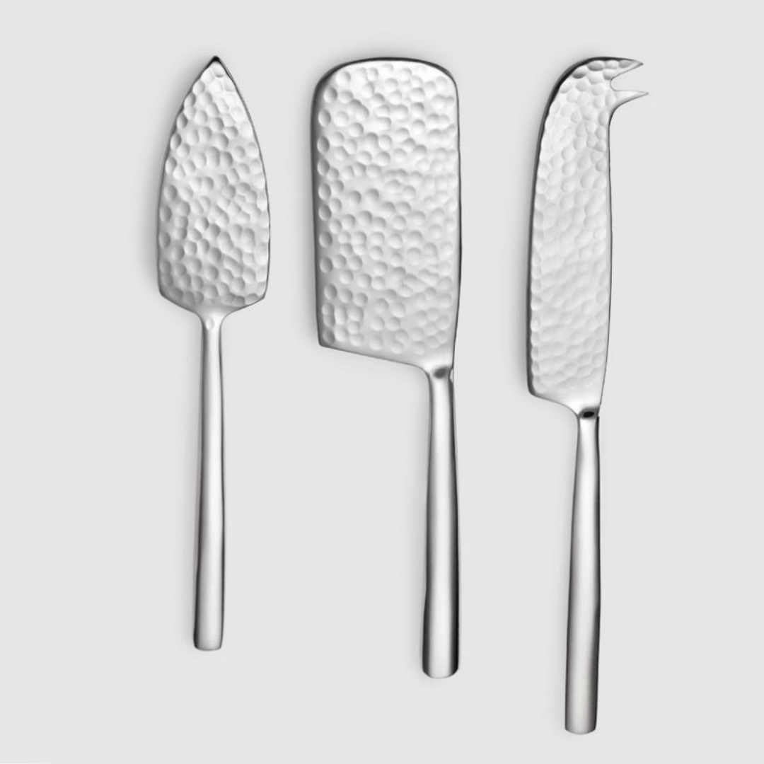 Versa Cheese Set by Mary Jurek Up Close view of hammered detail and smooth handle.