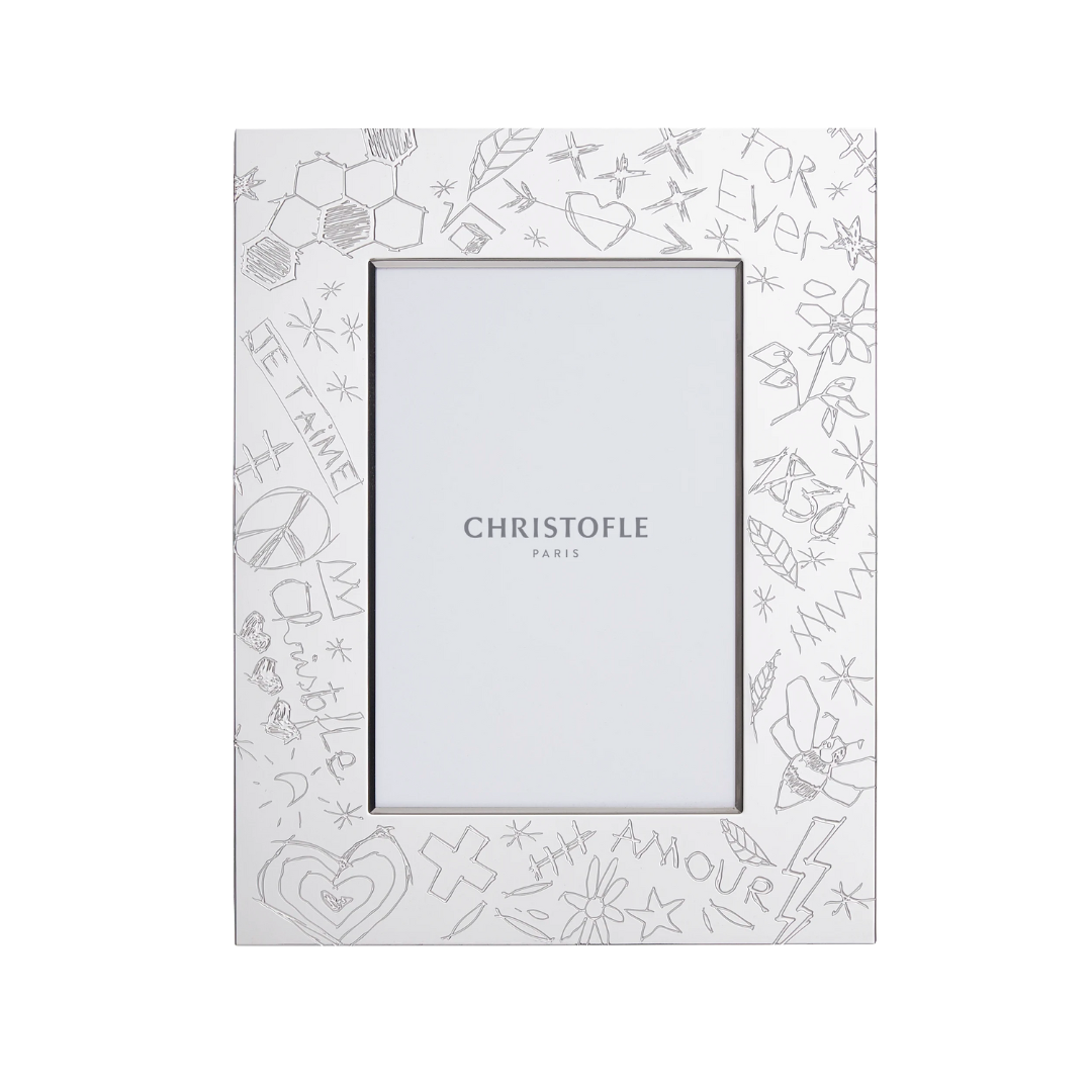 The up-right 4x6 frame is silver-plated and has graffiti symbols.