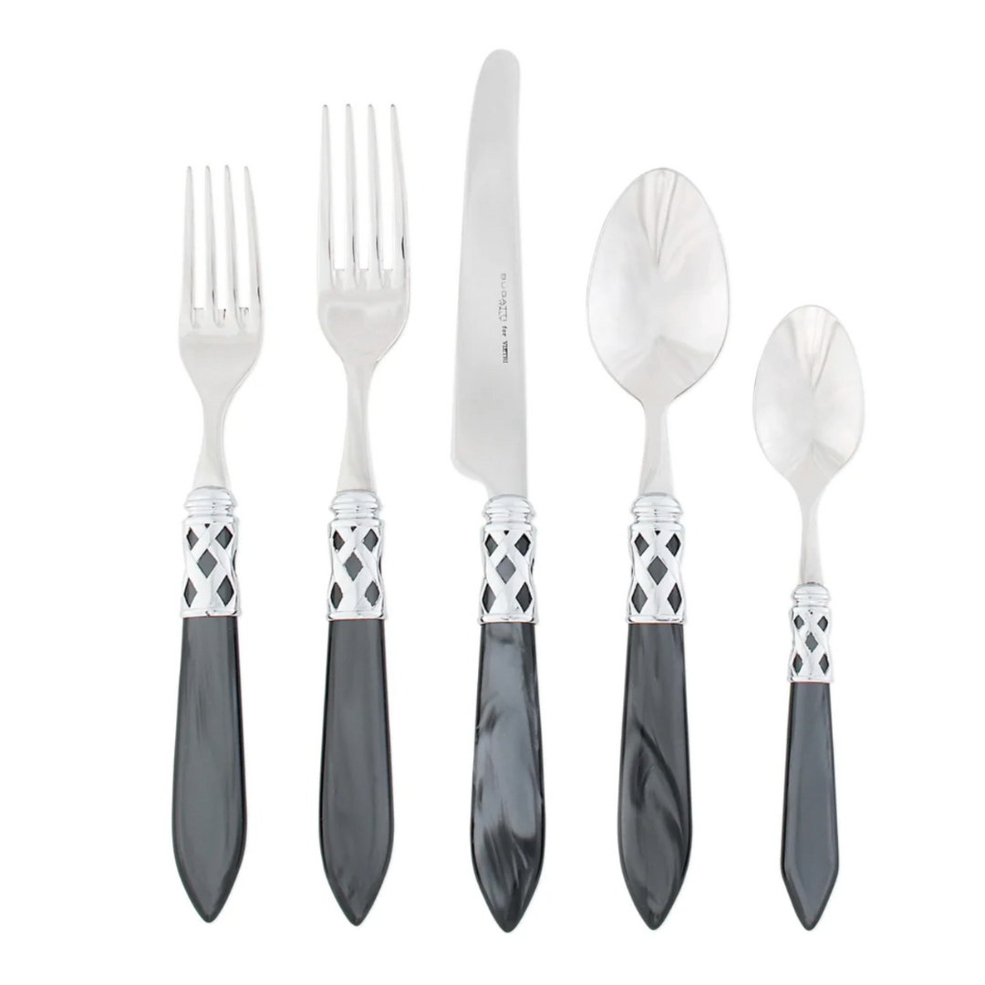 Aladdin brilliant flatware with charcoal handles.