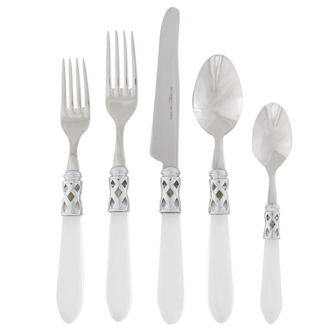 Clear handle and stainless steel flatware.