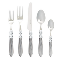 Aladdin flatware with light grey handles.