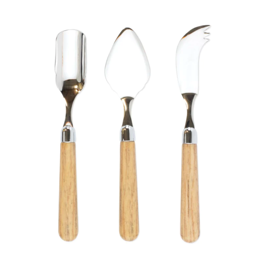The albero cheese knife set features a stainless steel design with wood handles, colored oak.
