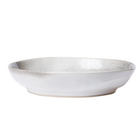The aurora pasta bowl features an ash-like design, and is made of stoneware.