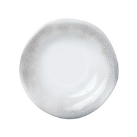This salad plate is made of stoneware and has an ash-like design along the ridges.