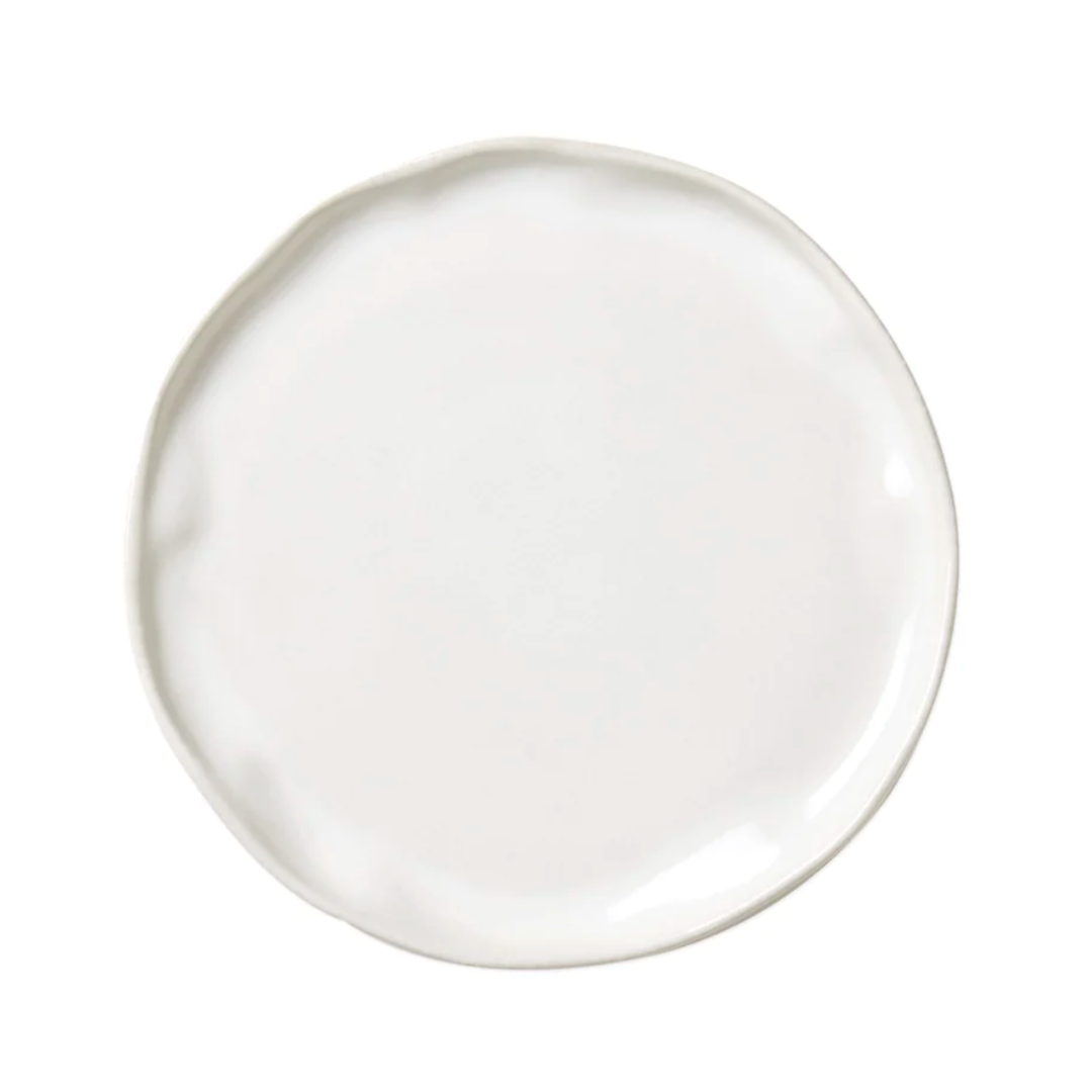 This salad plate is designed with an organic cloud-like texture and made is durable stoneware.