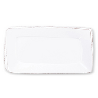 This rectangular platter is made in white of durable Italian stoneware.