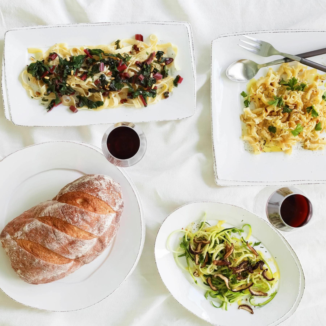 The rectangular platter is made of premium white stoneware.