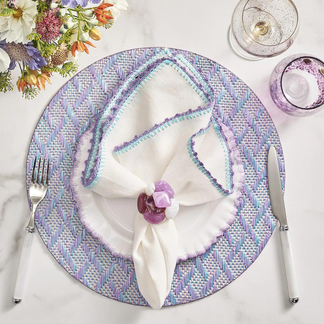 Knotted edge napkin in white, lilac, blue.