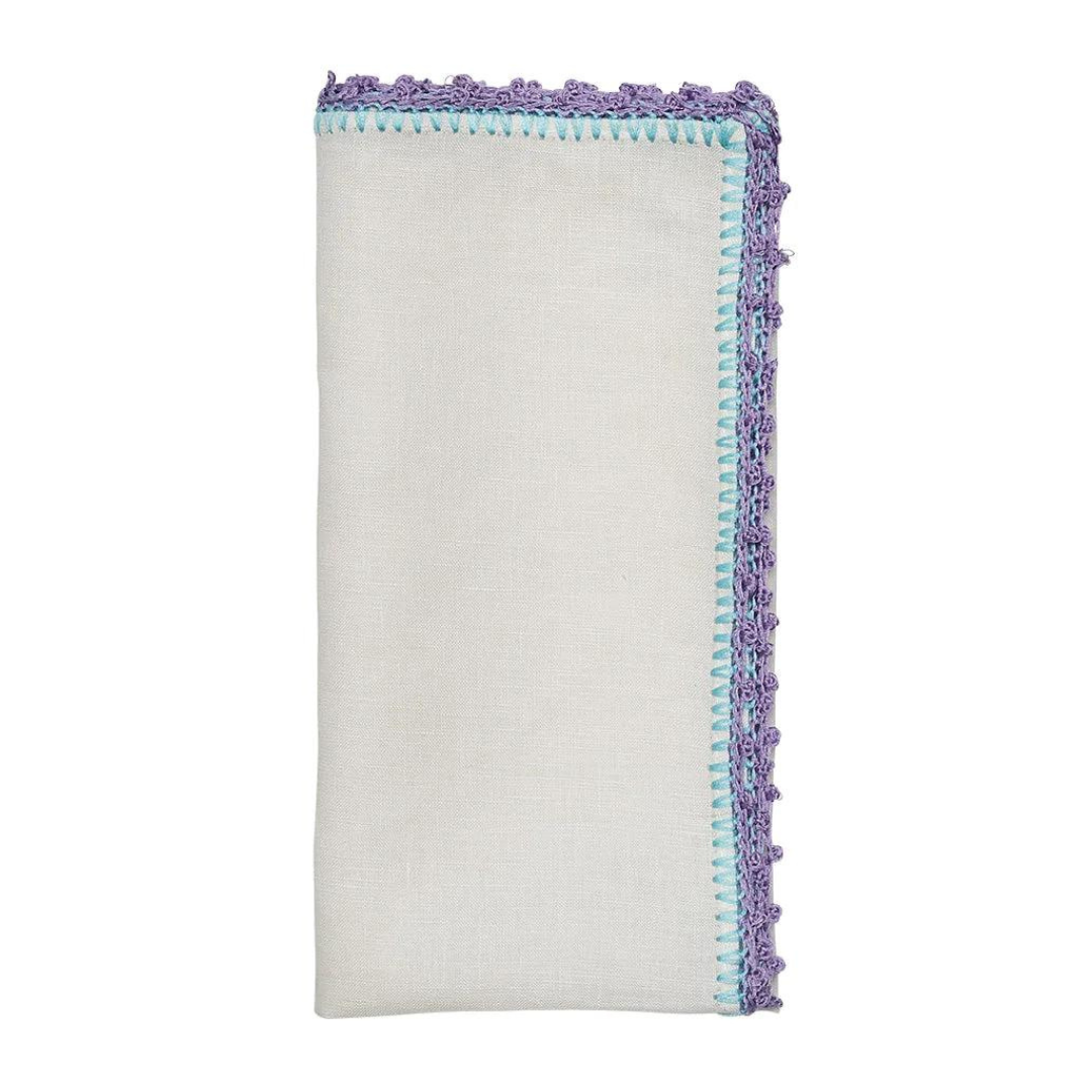 Knotted edge napkin in white, lilac and blue.