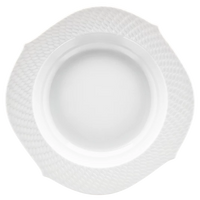 A white ceramic plate from the Meissen Waves Relief collection is seen from above against a soft, plain background. Highlighting the timeless elegance of Meissen craftsmanship, this modern dinnerware piece features a textured, patterned rim and a round center with gently squared edges—an ideal addition to any refined porcelain dinnerware collection.