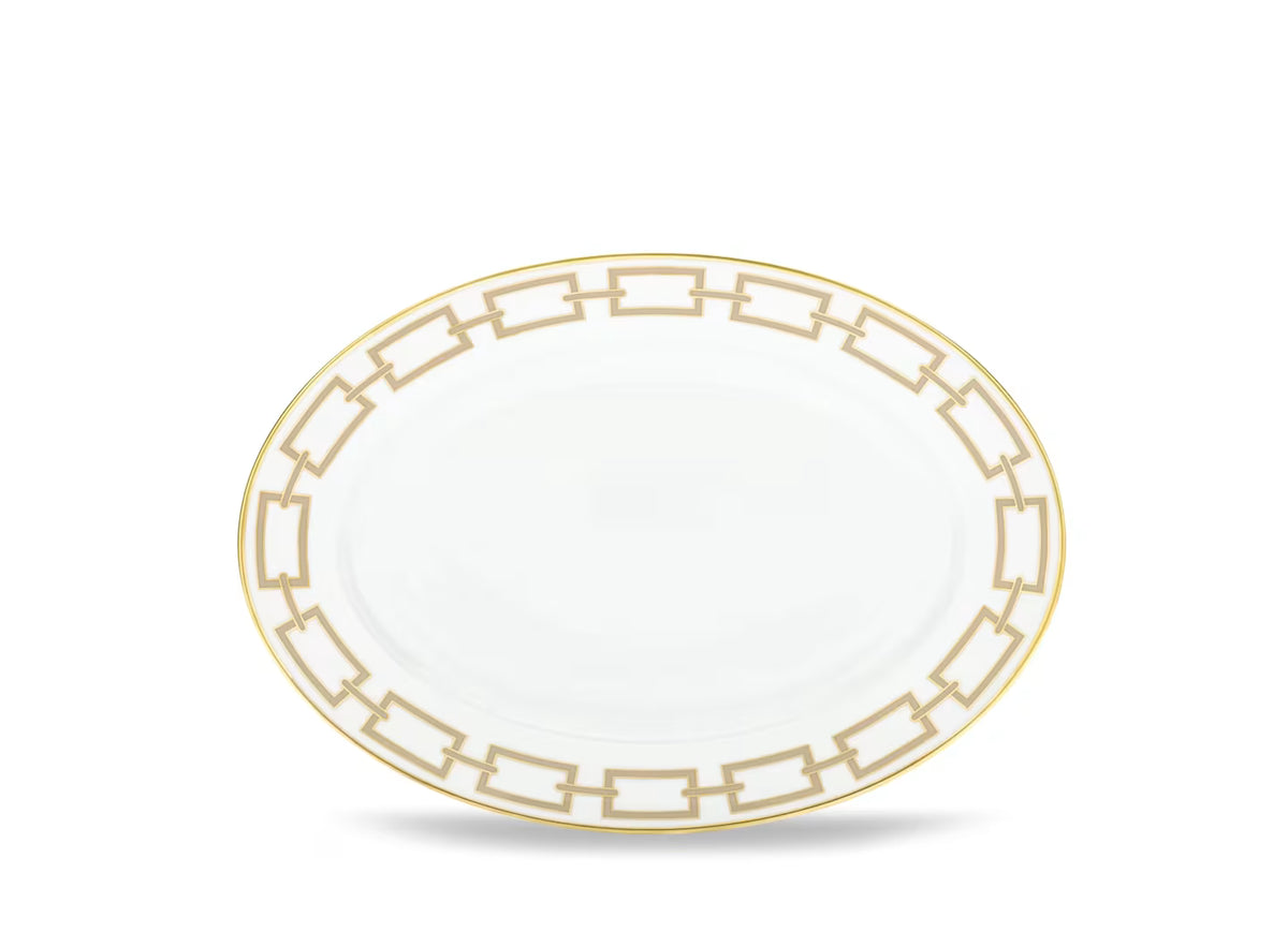 A Catene Cachemire Beige Dinnerware plate by Ginori 1735 features a geometric gold border around the rim, shown on a plain white background.