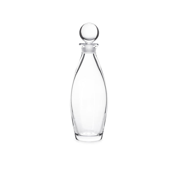 The Addison Decanter by Simon Pearce features a smooth, curved glass body and a round stopper. Displayed upright on a white background, this empty decorative decanter is an elegant addition to any barware collection.