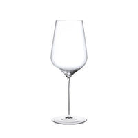 A clear, empty wine glass with a long stem and a wide bowl, crafted from lead-free crystal by Nude Glassware, stands upright against a white background. This elegant piece is part of the Stem Zero Barware collection, exemplifying the exceptional quality of Nude Glassware.