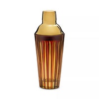 Amber Prism Cocktail Shaker by L’Objet, featuring vertical ridges and a gold-toned lid, beautifully displayed against a plain white background—an elegant example of hand-crafted glassware from the Prism collection.