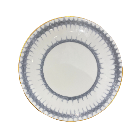 The Marie Daâge Rafia 5 Dinnerware by Marie Daâge is a round white porcelain plate featuring a gray spiked radial border and thin gold rim, hand-painted in France to add elegance to your tableware collection.