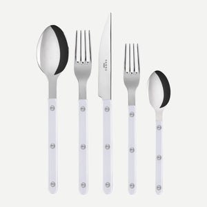 The Sabre Bistrot Pearly 5 Piece Setting - Shiny, part of the renowned Bistrot collection and expertly crafted in France, features a tables­poon, table fork, dinner knife, salad fork, and teaspoon. Each piece boasts a shiny metal head paired with an elegant mother of pearl handle adorned with three silver rivets. The set is artfully arranged in a row against a white background, embodying timeless style and exceptional craftsmanship.