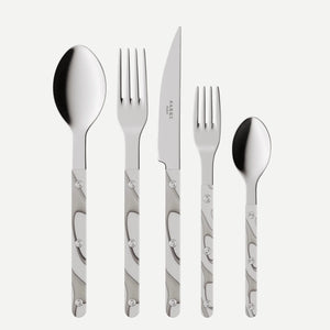 The Sabre Bistro Dune Flatware 5 Piece Setting features 18/10 stainless steel heads and patterned metal handles, including a large spoon, dinner fork, serrated knife, small fork, and small spoon displayed side by side on a white background.