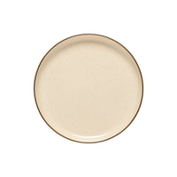 The Casafina/Costa Nova Pacifica Dinnerware Monterosa Beige plate is round with a beige ceramic finish and a slightly darker brown rim, shown from above on a plain white background.