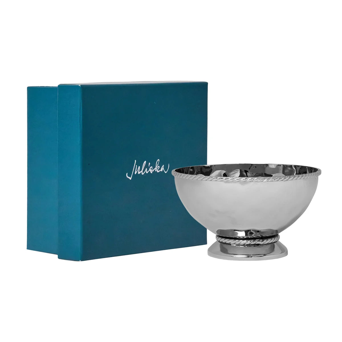 A shiny hammered stainless steel Graham Cocktail Bowl by Juliska, featuring a textured rim and base, sits beside a teal gift box adorned with the Juliska logo in white script.