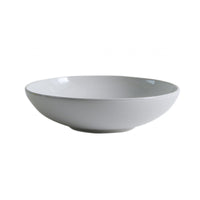 A plain, white, shallow ceramic bowl with a smooth surface, viewed from a slight angle on a plain white background, highlights the durable ceramic craftsmanship of Jars - Rosenthal’s Tourron Dinnerware Neige, handmade in France.