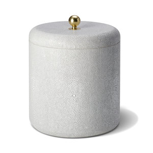 The Aerin Shagreen Ice Bucket features a cylindrical, white textured design with a matching lid and gold knob, bringing elegant luxury to any home bar.