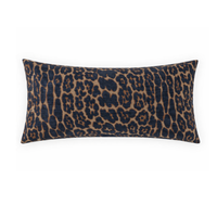 The Ellina Pillow Blue 14 x 24 by D.V. KAP / Canaan Company features a bold leopard-inspired animal pattern in dark navy and tan on a white background, making it a striking rectangular accent for any room.