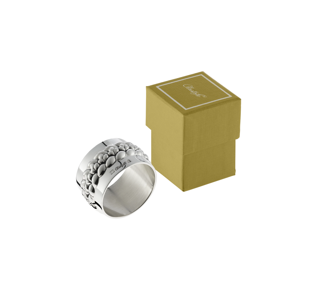 Christofle Babylone Silver Plated Napkin Ring in silver-plated metal with a raised, pebbled texture on its exterior, shown beside its small, square box.
