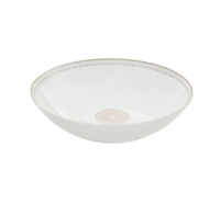 The Malmaison Imperiale Porcelain Dinnerware Platinum by Christofle showcases a white porcelain bowl adorned with a subtle decorative platinum pattern along the rim and an intricate circular motif at the center. Presented against a plain white backdrop, it exemplifies Christofle’s commitment to luxury tableware, seamlessly blending classic elegance with exceptional craftsmanship.