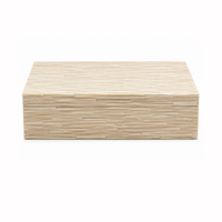 The Bone Tiles Box - Ivory - Large by A Sanoma Inc is a rectangular beige decorative box featuring a textured, layered bone pattern, shown closed against a plain white background.