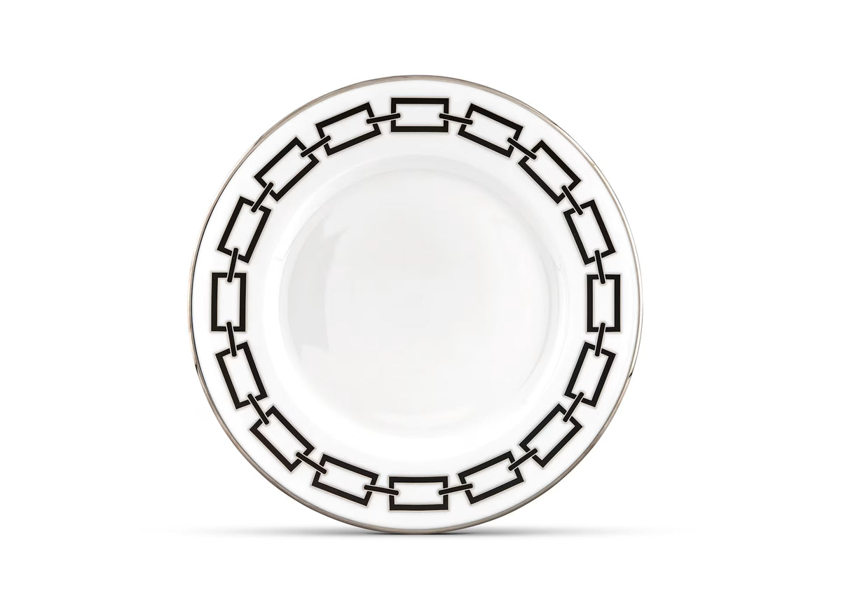 A Ginori 1735 Catene Nero dinner plate, featuring a white ceramic surface accented by a geometric black chain-link pattern around the rim, viewed from above on a plain white background.