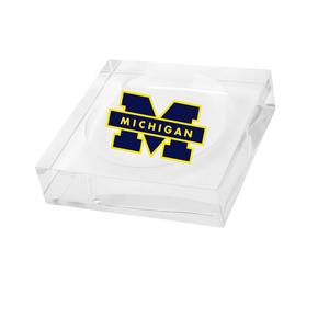 The Eye Candy College Sundry Jewelry/Catchall Dish features the University of Michigan’s block M logo in maize and blue with "MICHIGAN" across the center—a perfect gift for Wolverines and college students alike.