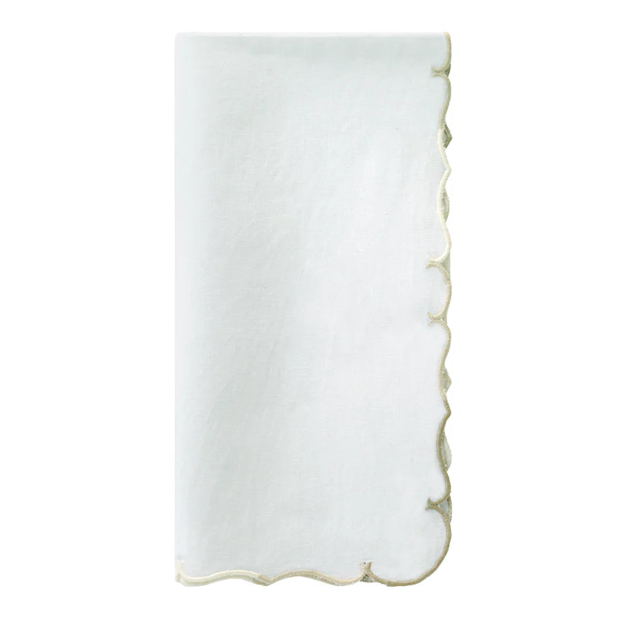 A set of four white Bodrum Firenze Napkins with gold embroidered scalloped edges, elegantly displayed on a plain white background.