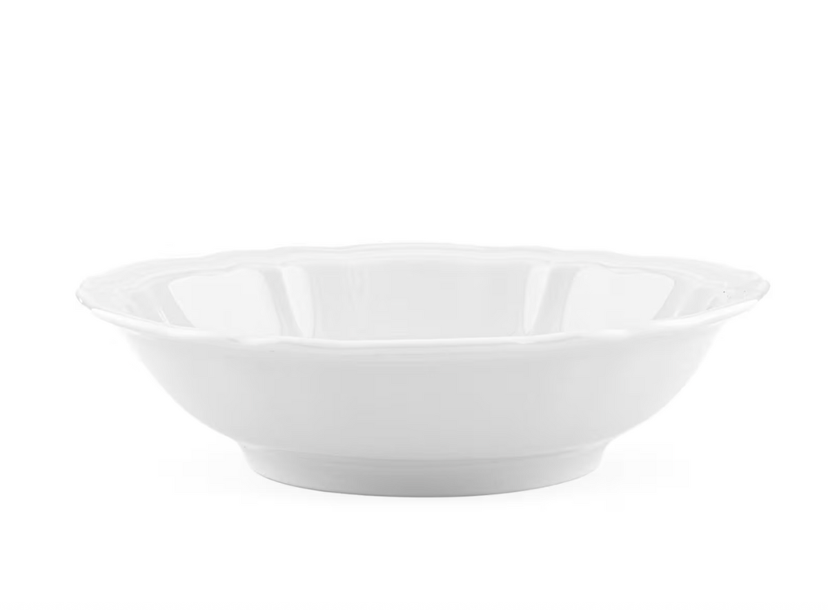 The Antico Doccia Dinnerware by Ginori 1735, featuring a white ceramic bowl with a scalloped edge reminiscent of pure porcelain, is photographed against a plain white background.