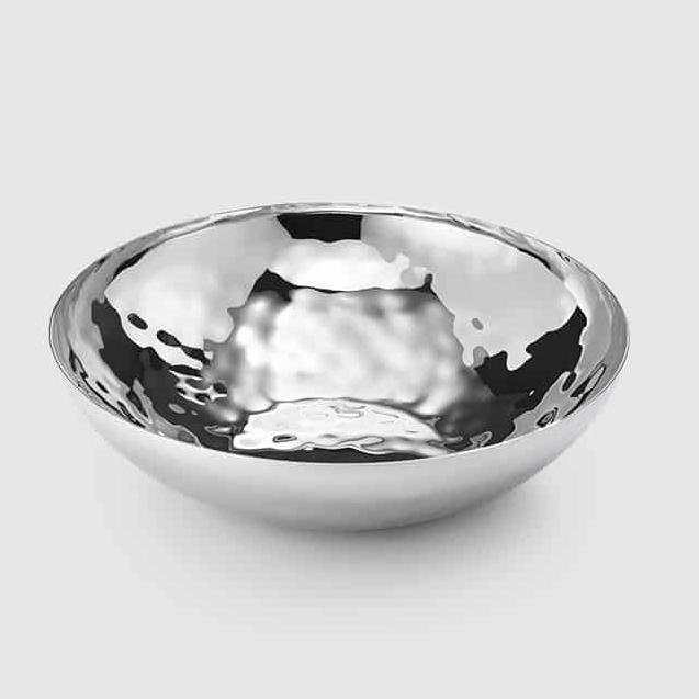 The Luna Serving Bowl 12" by Mary Jurek, crafted from shiny, hammered stainless steel with a round shape, is displayed on a plain light gray background.