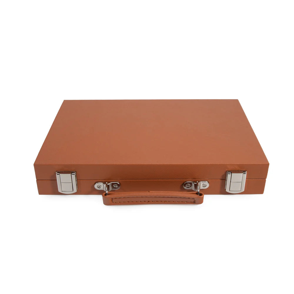The Mini Travel Backgammon Set by Brouk & Co is a closed rectangular brown leather case with a handle and two silver clasps, resembling a portable backgammon game, shown against a white background.