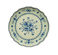 Vila Olive / Blue round plate with a scalloped edge featuring a pale green base and blue floral patterns.