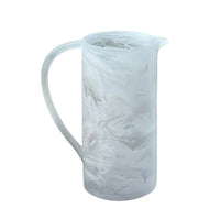 Dawn Resin Swirl Pitcher - White, a tall translucent pitcher with a white and gray marbled swirl pattern and a curved handle.