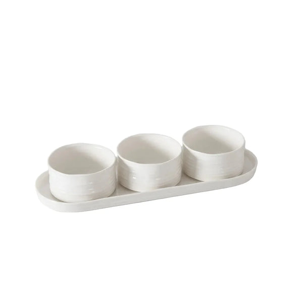 Three small white porcelain snack bowls rest on a matching tray from the PAMPA BAY Le Blanc Serving Set 4 Piece, set against a plain white background.
