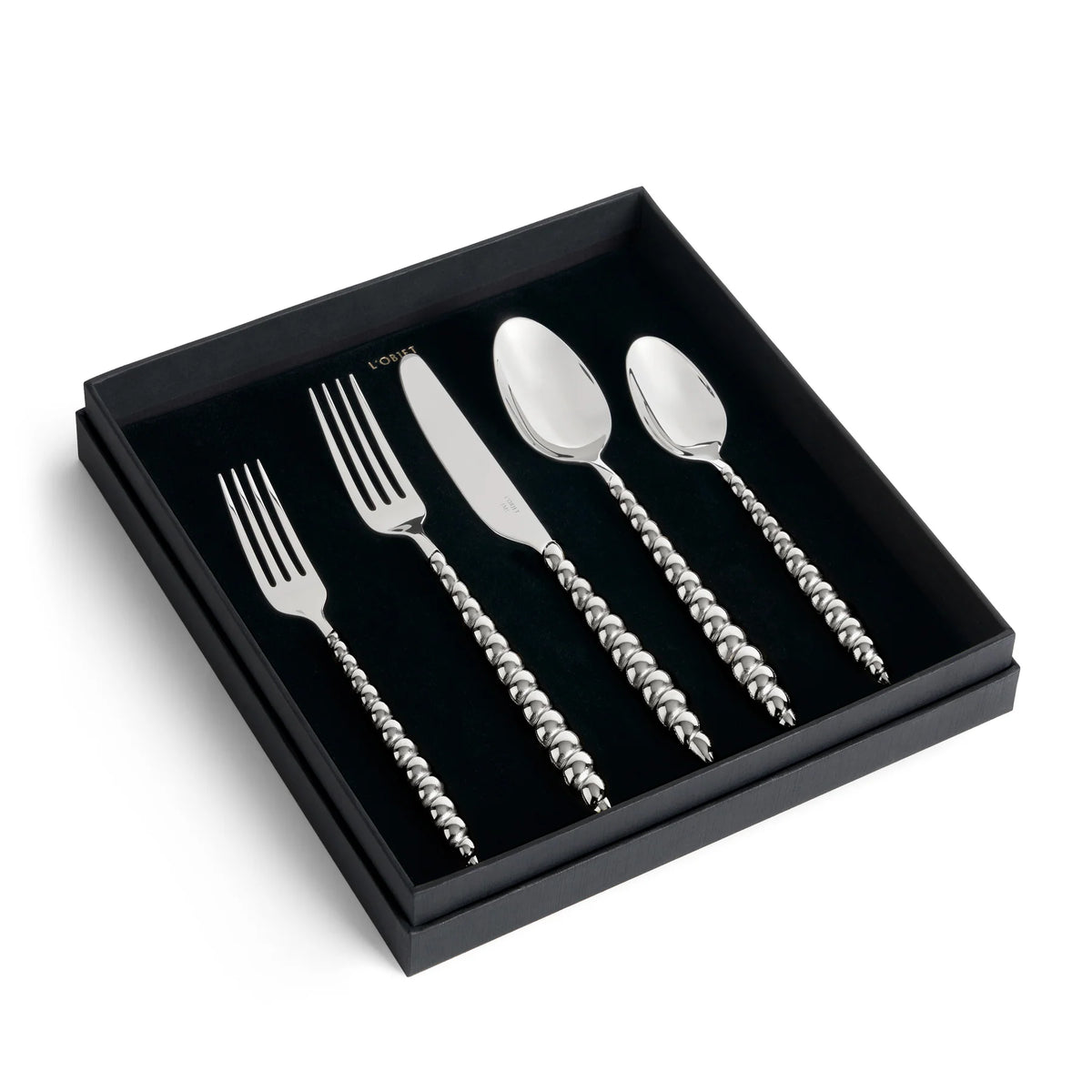 Jessica McCormack Shell Flatware 5 pc Set - Stainless Steel featuring textured, beaded-style handles, presented in a black display box as a luxury designer tableware collection.