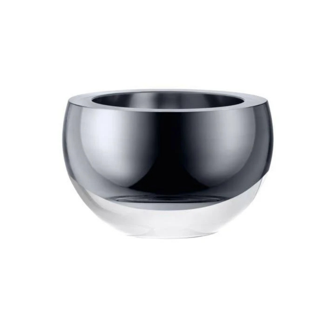 The LSA Hostess Bowl – Platinum Large features a round, reflective silver design with a wide opening and smooth, shiny surface, displayed against a plain white background. Inspired by mouth-blown glass bowls, this elegant piece highlights the expert craftsmanship typical of decorative glassware made in Poland.