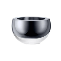 The LSA Hostess Bowl – Platinum Large features a round, reflective silver design with a wide opening and smooth, shiny surface, displayed against a plain white background. Inspired by mouth-blown glass bowls, this elegant piece highlights the expert craftsmanship typical of decorative glassware made in Poland.