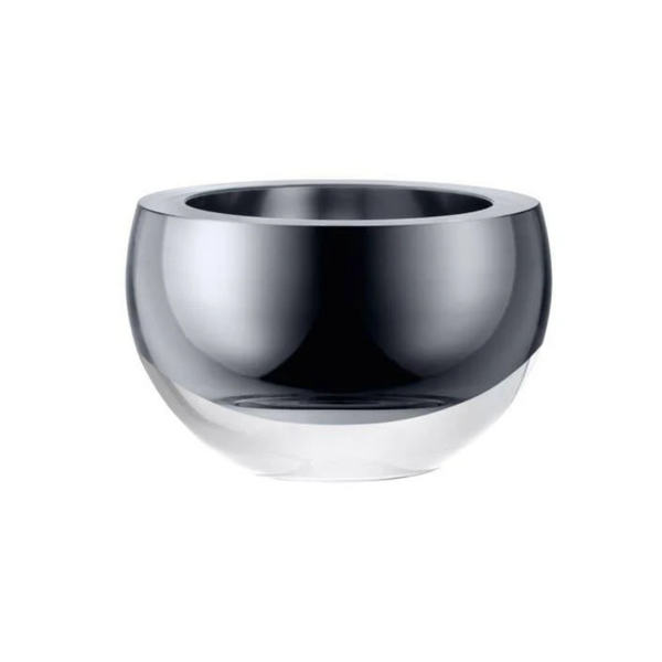 The LSA Hostess Bowl – Platinum Large features a round, reflective silver design with a wide opening and smooth, shiny surface, displayed against a plain white background. Inspired by mouth-blown glass bowls, this elegant piece highlights the expert craftsmanship typical of decorative glassware made in Poland.