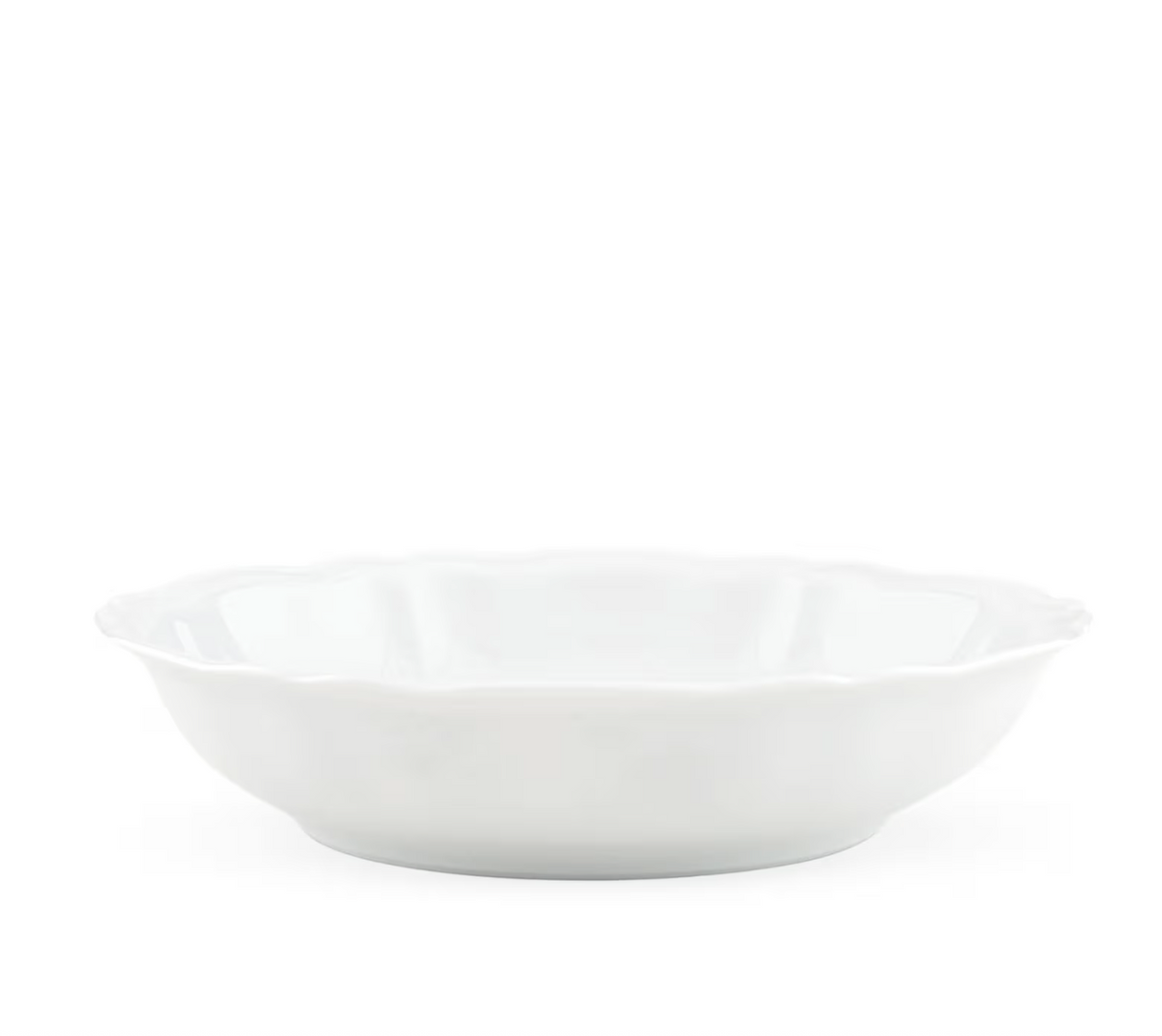 A side view of the Ginori 1735 Antico Doccia Dinnerware white ceramic bowl, featuring a scalloped edge inspired by pure porcelain Antico Doccia designs, set against a plain white background.