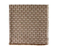 A folded fabric napkin with a beige and brown geometric grid pattern and fringed edges, resembling the Lattice Fringe Napkin Set of 4 by Deborah Rhodes.