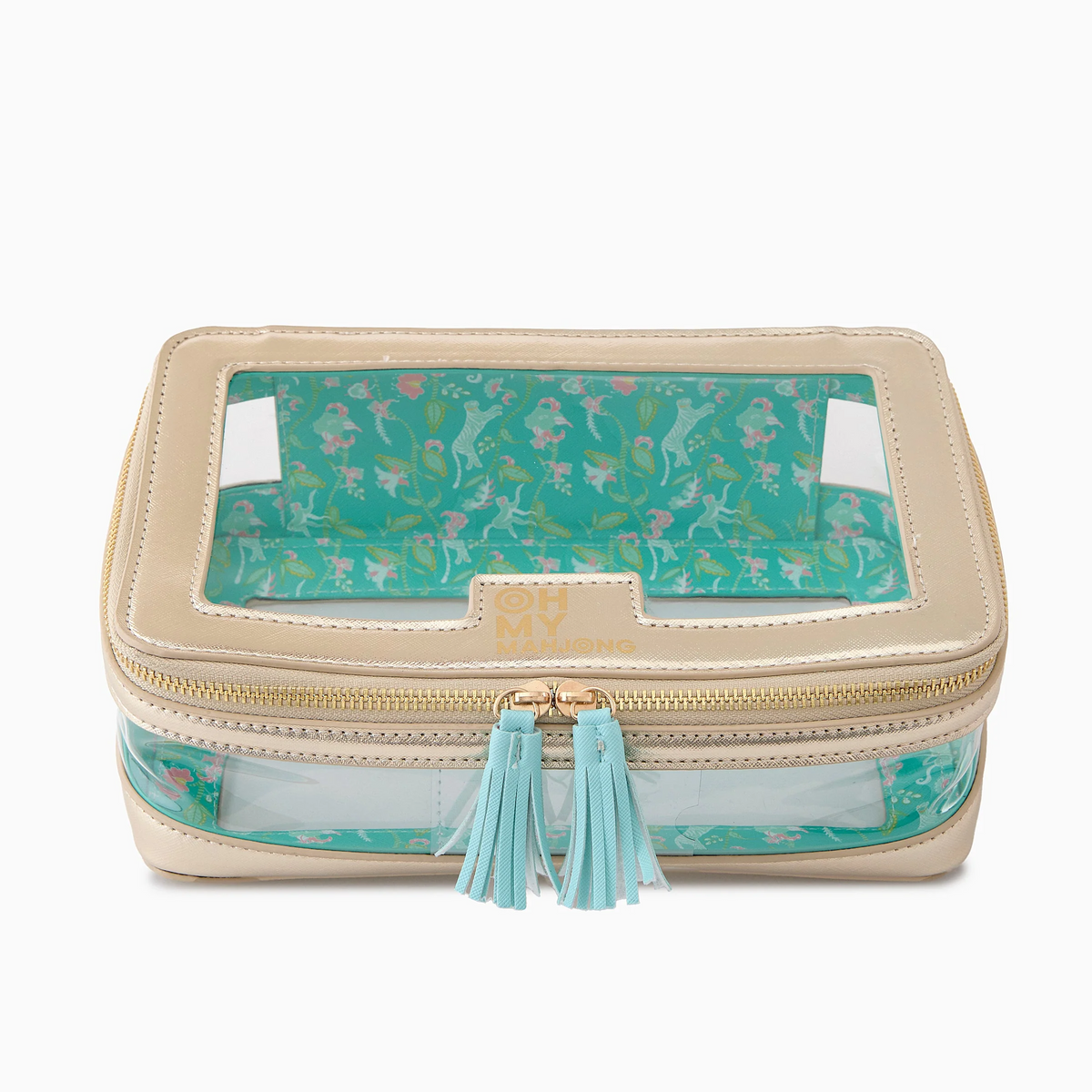 Introducing the Mahjong Tile Storage Bag by Oh My Mahjong—a beige cosmetic bag featuring a clear top and turquoise tassel zippers. This versatile accessory serves perfectly as both a chic organizer for daily essentials or as a stylish Mahjong storage bag. The interior is lined with a turquoise background adorned with whimsical mermaids and seaweed patterns, combining practicality with playful elegance.