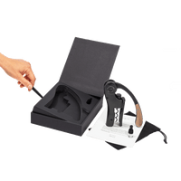 L’ Atelier du Vin Lever Wine Opener - Black with a wooden handle, displayed with its storage box, a small vial, and an instructional pamphlet in this luxury wine gift set.