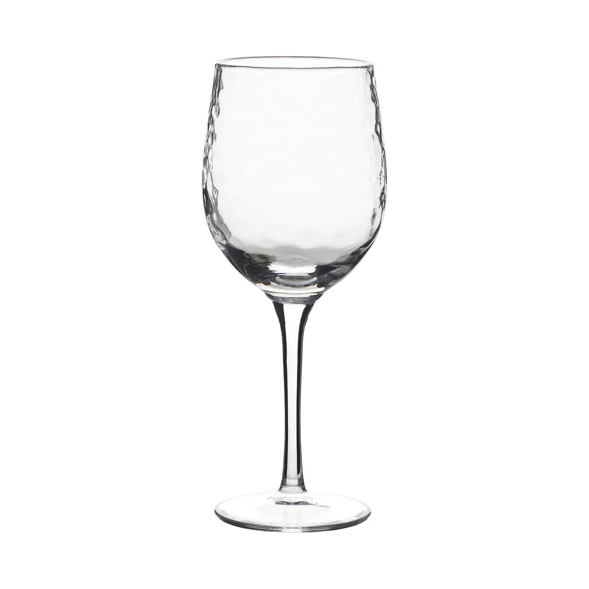 The Juliska Puro Glassware wine glass features a long stem and a textured, dimpled bowl. Dishwasher safe, it stands upright empty on a white background.