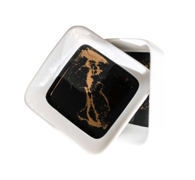 Two Painted Dip Bowls - Black Ember by Lynn & Liana Serveware, one slightly overlapping the other, each filled with a dark liquid swirled with tan seasoning, set on a clean white background.