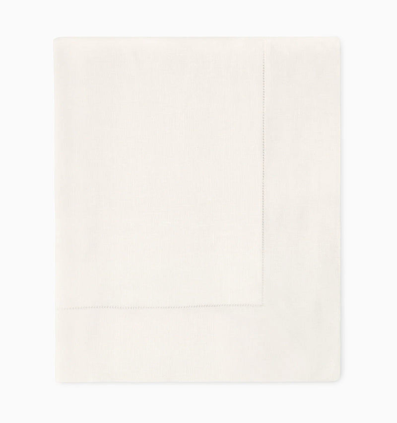 The Sferra Festival Tablecloth, crafted in crisp white with subtle hand hemstitching along the border, is elegantly displayed against a plain white background—an ideal accent to enhance classic table settings.