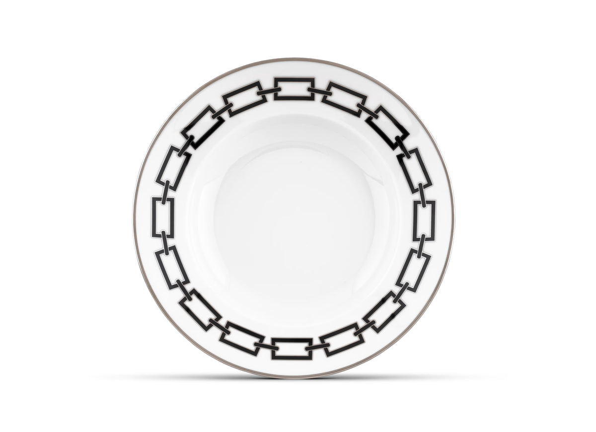 A round white Catene Nero dinner plate by Ginori 1735, featuring a black geometric chain pattern around the rim, displayed against a plain white background.